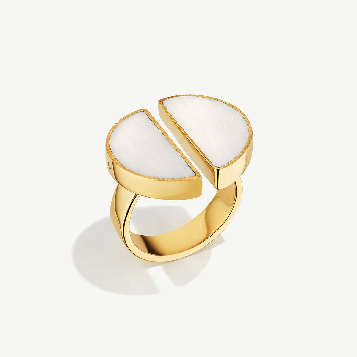 Split moon ring with sculptural negative space and mixed stacking potential