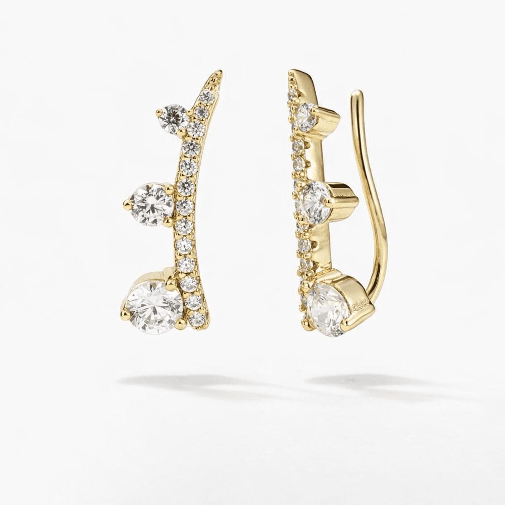 gold climber earrings in 18k gold vermeil, modern ear climber design with graduated clear CZ stones