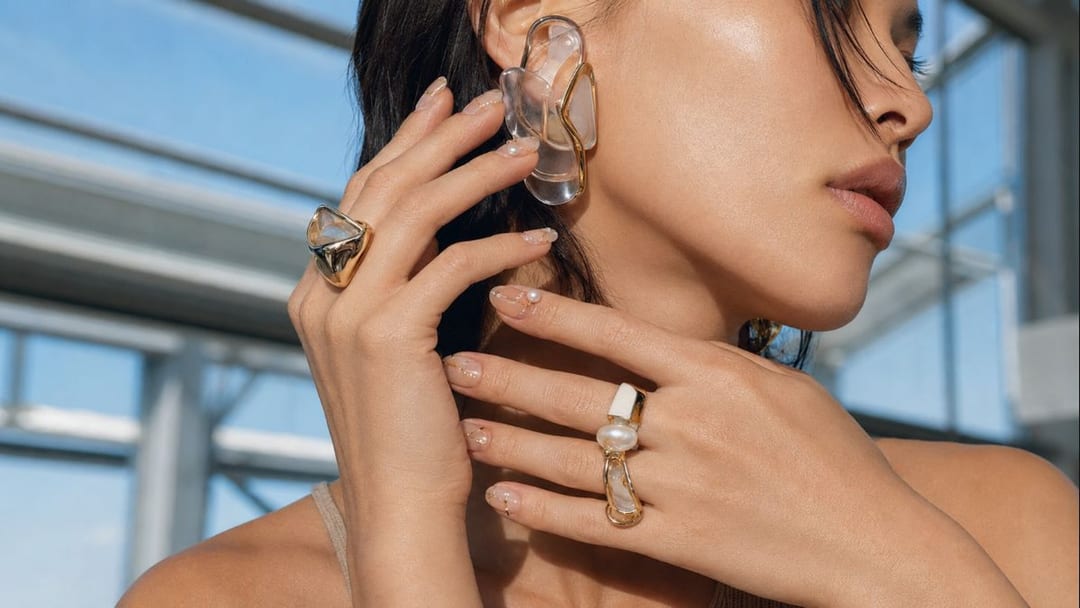 cherry blossom nails without cliché shown as five sculptural spring nail concepts