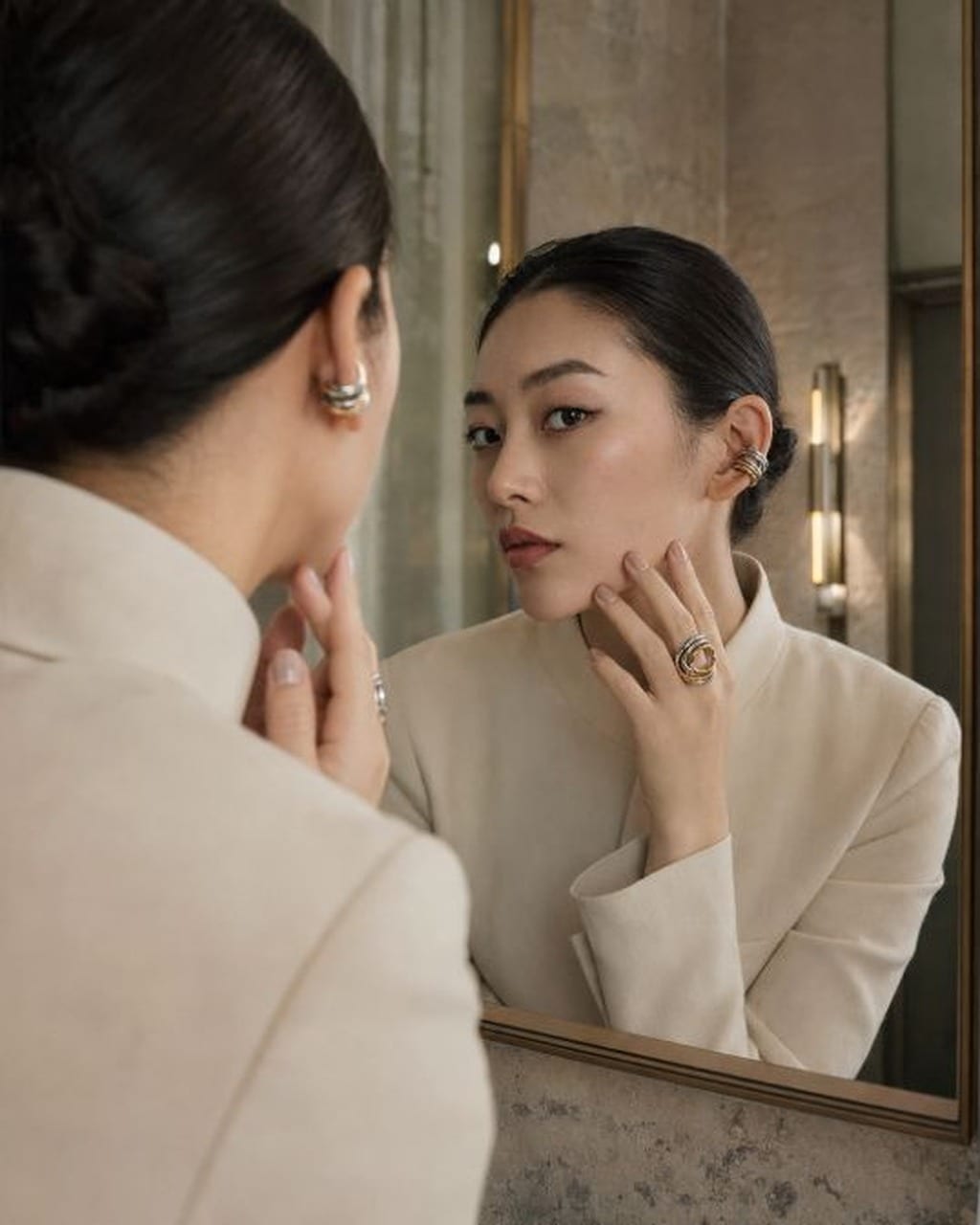 travel style psychology mirror scene with smoky ivory travel nails and turquoise jewelry accent